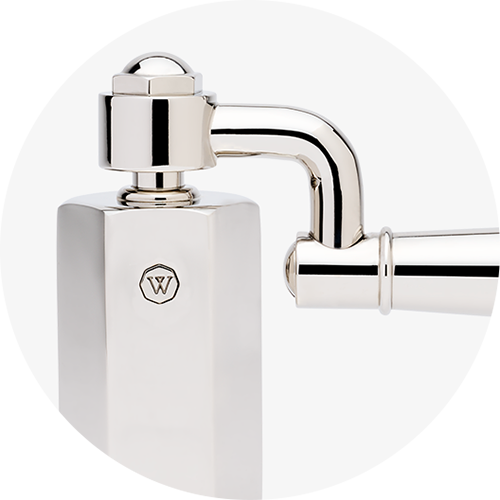 THE BATH Drop Lever Handle Pronounced mechanics with luxurious heft and elegant utility.
