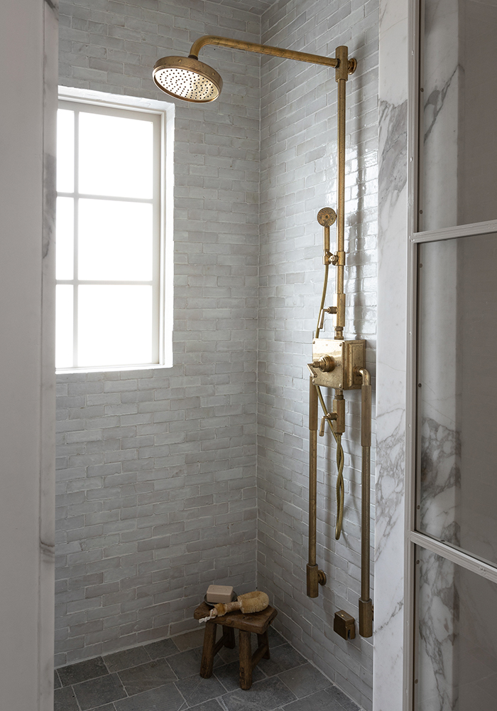 Gray Shower, Gold System, Wooden Stool in Corner